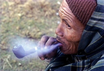 A khasi old man enjoying smoking, Meghalaya, India, Asia