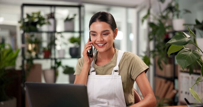 Laptop, online order and phone call with woman in flower shop for sale of floral arrangement. Computer, happy and plant nursery with florist talking at desk in office of small business for update - Powered by Adobe
