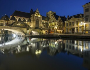 Naklejka premium St. Michael bridge on Graslei and Korenlei, with St. Nicholas Church, Ghent, Flanders, Belgium, Europe