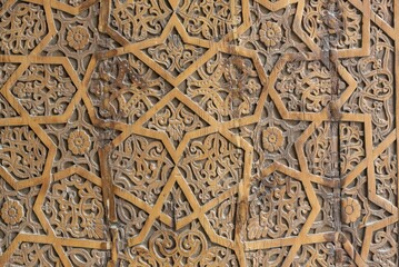 Ornate Wooden door at Allakuli Khan Madrasah, Khiva, Uzbekistan, Asia