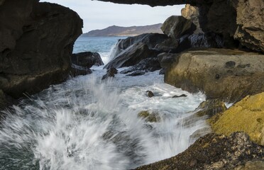 Foaming surf, rock gate, Punta Guadalupe Rock Gate, La Pared Cliff Coast, Fuerteventura, Canary Islands, Canary Islands, Spain, Europe