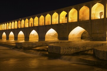 Illuminated Si-o-se Pol Bridge or Allah-Verdi Khan Bridge at night, Esfahan, Iran, Asia