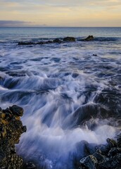 Sea, morning atmosphere on the rocky coast near Corralejo, Parque Natural de Corralejo,...