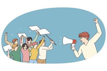 Male leader with megaphone head demonstration with diverse people holding banners and posters. Activists on strike or riot protest against discrimination, vote for freedom. Vector illustration