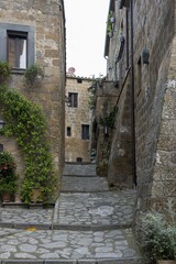 Ancient tufa buildings in the hilltop village of Civita di Bagnoregio, Lazio, Italy, Europe