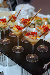 An assortment of appetizers and hot dishes.