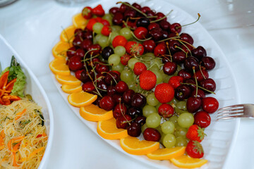An assortment of appetizers and hot dishes.
