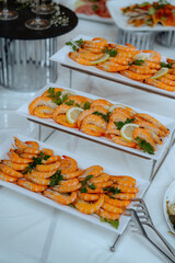 An assortment of appetizers and hot dishes.