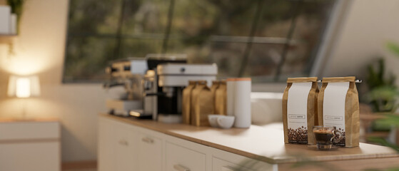 A close-up of coffee bean bags displayed on a minimalist wooden counter in a cozy, contemporary cafe
