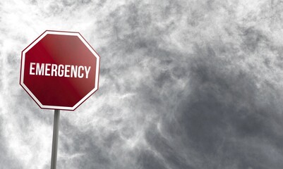 Emergency, red sign with clouds in background