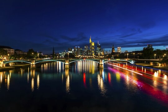 Illuminated Skyline and Ignatz Bubis Bridge at Blue Hour, City Centre, Frankfurt am Main, Hesse, Germany, Europe