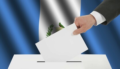 The Guatemala flag and the hand with the bulletin about the ballot box