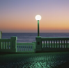 Street lamp at beach promenade, Sao Pedro de Muel, Portugal, Europe