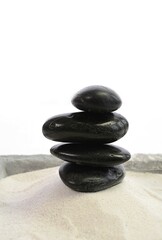 Pile of hot stones on sand