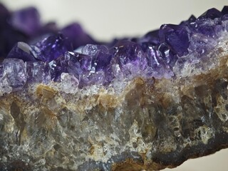 purple crystals of quartz as a background, closeup of photo