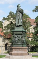 Fototapeta premium Luther Memorial, west side, relief of the young Luther, bronze, 1895, sculptor Adolf von Donndorf, renovated state in 2014, Eisenach, Thuringia, Germany, Europe