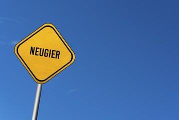 Neugier, yellow sign with blue sky