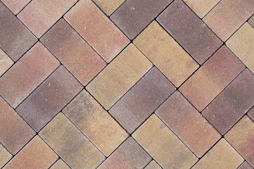 yellow purple stone paving slabs close up