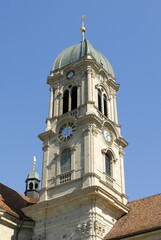 Einsiedeln - the clocktower from the cathedral - Switzerland, Europe.