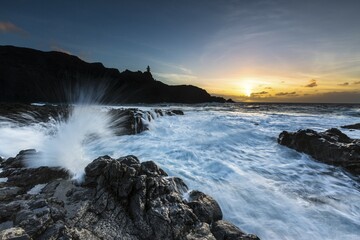 Surf, rocky coast with foaming waves at sunset, Faro de Teno, Buenovista, Tenerife, Canary Islands, Spain, Europe