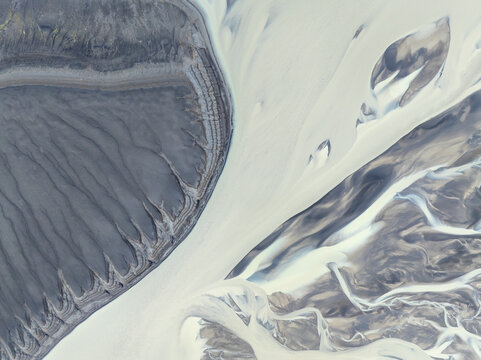 Abstract patterns in a river from a glacier.
