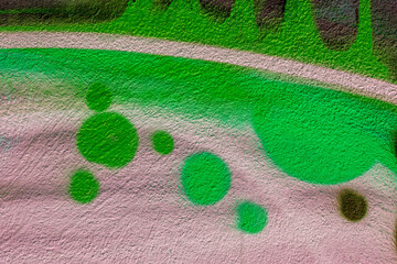 beautiful wallpaper of street wall graffiti painting of aerosol urban art. Colorful city background of spray graffiti drawing in modern culture style