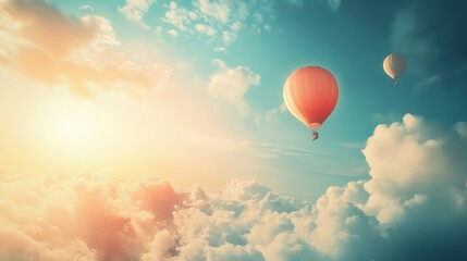 Fototapeta premium dreamy image of balloons floating serenely in the air, surrounded by soft clouds and the bright morning sky.