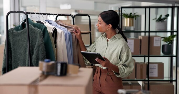 Tablet, clothing and woman in office for research on apparel industry for exclusive line with online order. Digital technology, creative and female Haute Couture fashion designer with distribution.