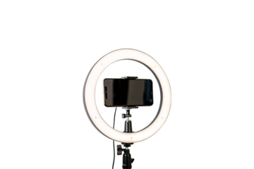 The back of a smartphone is visible through a bright ring light, emphasizing balanced lighting for content creators, isolated on a transparent background