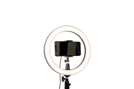 The back of a smartphone is visible through a bright ring light, emphasizing balanced lighting for content creators, isolated on a transparent background