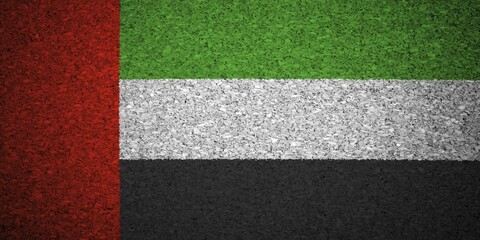 Fototapeta premium The United Arab Emirates flag painted on a cork board