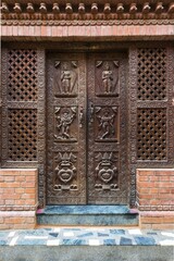 Carved wooden door, Kirtipur, Nepal, Asia