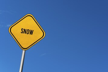 Snow, yellow sign with blue sky