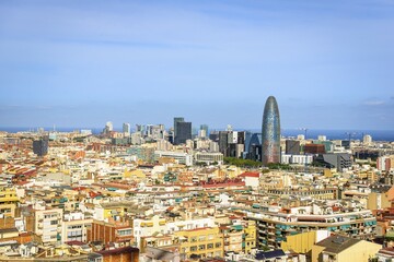Fototapeta premium City view with houses and Torre Agbar by architect Jean Nouvel, from the Sagrada Familia, Barcelona, Catalonia, Spain, Europe