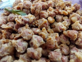 Fried peanuts in flour or Kacang Kribo.