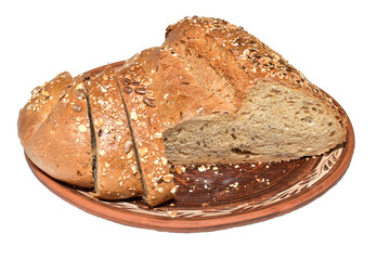 Fresh whole grain bread with seeds cut into slices lies on PNG background.