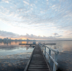 Obraz premium sunrise on the bridge over the water