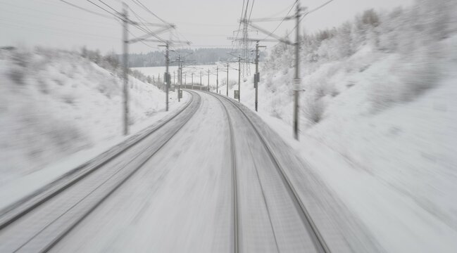 Snow-covered tracks, Westbahn line near Tullnerfeld, Lower Austria, Austria, Europe
