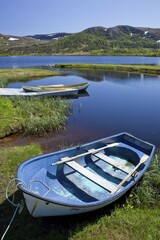 Fototapeta premium Fishing boats on the clear lake Almotjonna, Denstad, Norway, Scandinavia, Europe