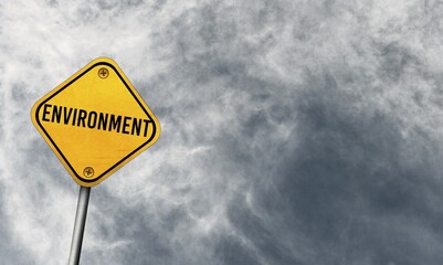 Environment, yellow sign with cloudy sky