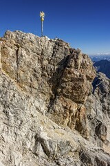 Fototapeta premium Gilded summit cross, Zugspitze, Garmisch-Partenkirchen, Wetterstein, Eastern Alps, Upper Bavaria, Bavaria, Germany, Europe