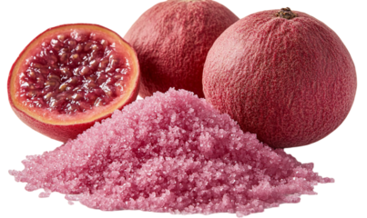 Close Up Of Pink Guava Halves And Pile Of Pink Crystallized Suga