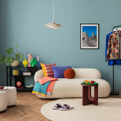 Modern and colorful interior of living room with design boucle sofa, mock up poster, shelf, plants,...
