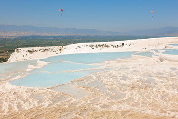 Pamukkale white mineral limestone natural pool. Geology landmark. Turkey