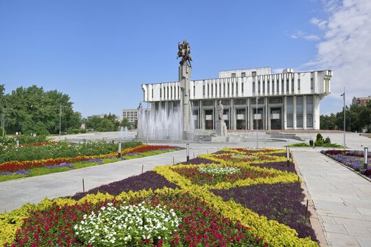 Kyrgyz National Philharmonic house and fountain, statues evocating the epic poem Manas, Bishkek, Kyrgyzstan, Asia
