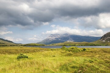 View over moorland to Loch nan Elachan and Ben Arkle, 787m, Sutherland, Scotland, United Kingdom, Europe