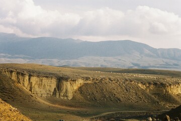 Scenic Armenian Plateau and Cliffs Under a Cloudy Sky
