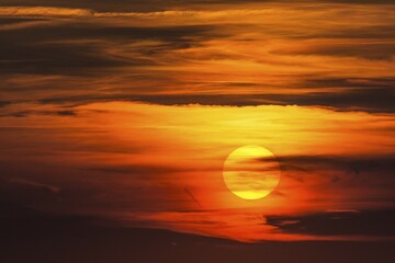 Glowing sun, sunset with clouds, evening sky, Germany, Europe