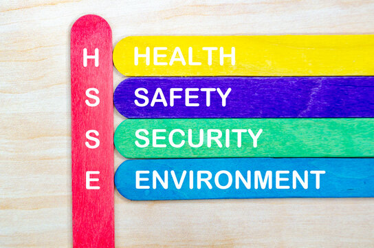 HSSE representing Health, Safety, Security and Environment text on wooden stick