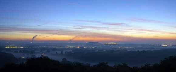 View from the Halde Norddeutschland spoil tip onto the Lower Rhine and the western Ruhr district at dawn, Neukirchen, North Rhine-Westphalia, Germany, Europe